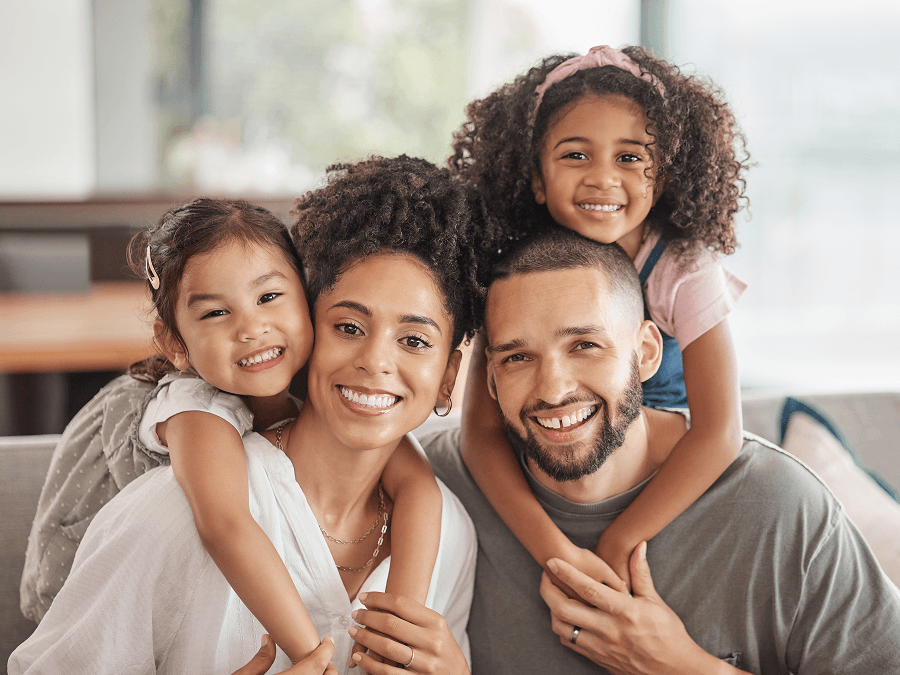 Family smiling at camera